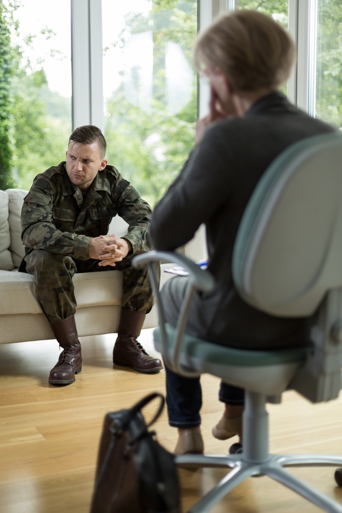 Soldier with physical trauma at psychiatrists office